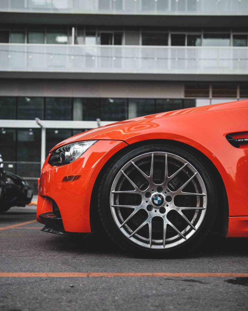 Car Wheels On A Red BMW